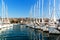 Summer morning in the harbor. Yachts parking in harbor, Harbor in Trogir, Croatia. Sailboats reflected in water. Boat rental