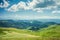 Summer mountains green grass and blue sky