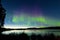 Summer night Northern lights over Lake Laberge