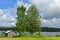 Summer northern landscape with barn