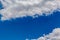 Summer in Omaha, aircraft in blue sky background over Ed Zorinsky lake park, Omaha, Nebraska