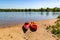 Summer in Omaha, Kayaks on the beach by the waters edge at Ed Zorinsky lake park, Omaha, Nebraska, USA