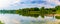 Summer in Omaha, Panorama Shoreline reflections in the lake at Ed Zorinsky Lake Park Omaha NE