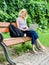 Summer online. Blogger create content for network. Blogger becoming inspired by nature. girl with laptop. woman has