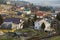 Summer panorama, Bukovel ski resort village in Carpathian mountains in Ukraine. Top view of residential houses, cottage under