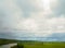 Summer panorama before a thunder-storm field a river and a forest in the distance, in the Russian