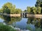 Summer Park. Exquisite stone arch bridge