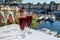 Summer party with kir royal cocktail, tasting of French brut champagne sparkling wine and cold creme cassis in glasses in yacht