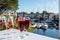 Summer party with kir royal cocktail, tasting of French brut champagne sparkling wine and cold creme cassis in glasses in yacht