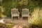 Summer peaceful vintage garden nook with metal furniture