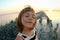 Summer portrait of a girl close-up, on a salt lake in the sunset, girl with contented and playful faces