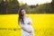 Summer pregnancy, in the warm season. Beautiful portrait of a pregnant woman on a warm summer day in the nature. Pregnancy and