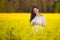 Summer pregnancy, in the warm season. Beautiful portrait of a pregnant woman on a warm summer day in the nature. Pregnancy and