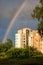 Summer rainbow over residential buildings