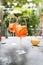 Summer refreshing aperol spritz cocktail in wine glass