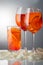 Summer refreshing faintly alcoholic cocktail Aperol spritz in a