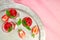 Summer refreshing strawberry sorbet, slush granita drink in serving glasses on silver tray