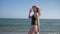 Summer rest, young woman in sunglasses relaxing on beach in happy journey against ocean