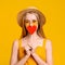 Summer Romance. Playful Young Girl Covering Mouth With Red Paper Heart