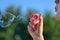 A Summer\\\'s Bliss: The Joy of Blowing Soap Bubbles at Sunset
