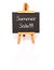 Summer Sale. Blackboard with text and easel.