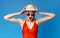 Summer Sale. Shocked Millennial Girl In Swimsuit Touching Head In Amazement