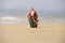 Summer Santa on sea sand. Holiday concept for New Year and Christmas.