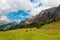 Summer scenery of a beautiful ranch in a grassy valley in Dolomites