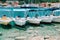 Summer scenery of port Fiskardo. Small day trip boats tied up to the pier. Picturesque outdoor scene of Kefalonia island, Greece,