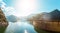 Summer scenery. of Vidraru Lake and Dam glowing in sunlight. creative image. location. Vidraru Dam, Romania. Carpathian Mountains,