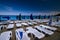 Summer seaview with deck-chairs and umbrellas