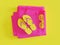 Summer Shutter Sunglasses Flip Flop sandals in yellow and magenta towel minimalistic above view
