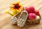 Summer still life with decorative sandals made of bark and small