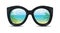 Summer sunglasses with a reflection of a tropical beach