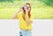 Summer sunny photo pretty hipster girl with vintage retro camera