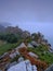 Summer sunrise with a clearing sea mist over the Valley of Rocks, near Lynton on the North Devon coast within the Exmoor National