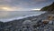 Summer sunset on the beach at Buck`s Mill on the North Devon Coast, UK