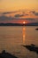 Summer sunset landscape over the Gulf of Alghero at Mediterranean Sea - Sardinia, Italy - with cliffs of Capo Caccia cape and