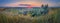 Summer sunset panorama. Scenic view over the green valley with bushes. Evening natural landscape
