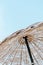 Summer texture and background. Wicker lattice roof of beach umbrella.