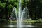Summer time and fountain splashing around in the Keukenhof Garden, Holland
