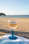 Summer time in Provence, drinking of cold gris rose wine on sandy beach and blue sea near Toulon, Var department, France