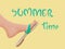 Summer time vector banner design with tanned kicking bare foot in sandal on the beach. Vector illustration