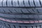 Summer tire close up. Tread texture of car tires