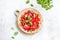 Summer tomato tart with soft cheese and basil