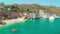 Summer touristic destination in Puglia, Italy: Faraglioni di Puglia Baia delle Zagare - Beach and faraglioni rocks formation