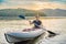 Summer Travel Kayaking. Man Paddling Transparent Canoe Kayak, Enjoying Recreational Sporting Activity. Male Canoeing