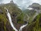 Summer Trollstigen serpentine and waterfall, Norway