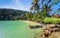 Summer vacation: beach with wooden boat and blue sky at Koh Ngam, Thailand