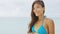 Summer vacation healthy Asian bikini girl enjoying tropical beach holiday